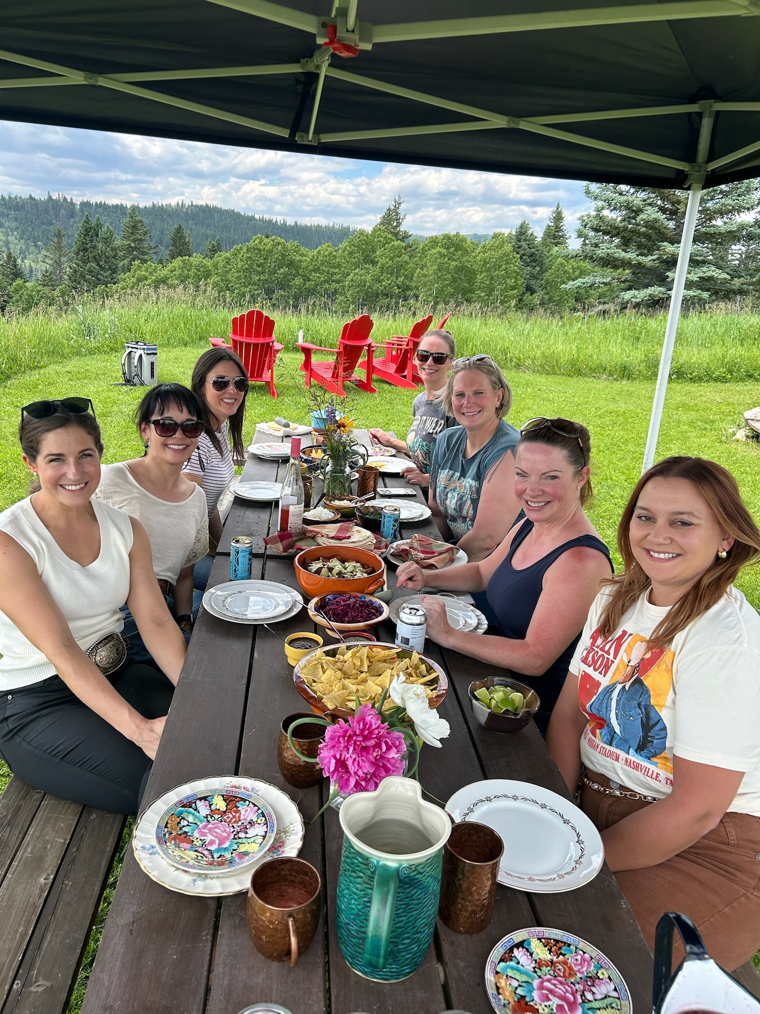 The Forge & Fire group gathered around the outdoor lunch table