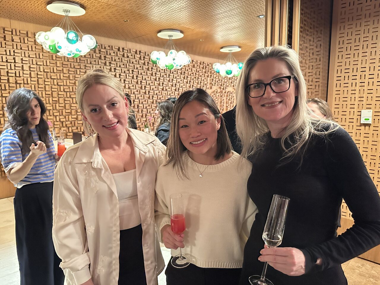 Four guests posing during the High Tea