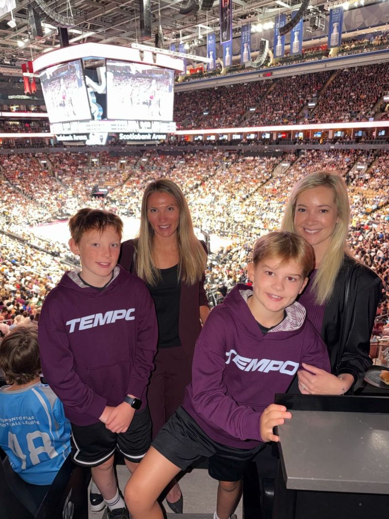 Goodlawyer guests and their children together at the Toronto Tempo game